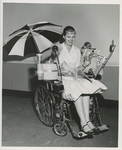 Woman in specially equipped wheelchair