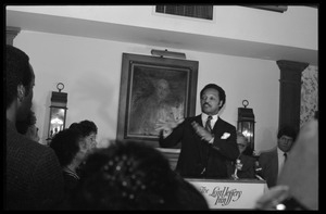 Jesse Jackson at the podium, addressing supporters