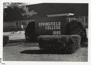 Springfield College sign in front of the Beveridge Center, ca. 1980