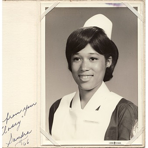 Head and shoulder portrait of a young woman in a nurse's uniform
