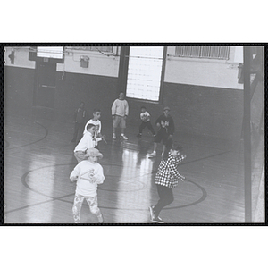 Several boys and girls playing dodgeball during the Boys and Girls Clubs of Boston 100th Anniversary Celebration event at the Charlestown Boys and Girls Club gymnasium