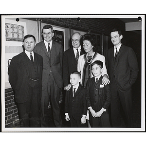 "Viewing the Art Exhibit: Overseers, Mr. William B. Osgood, Mr. Thomas E. Goode and Mr. Stokley P. Towles, along with Mr. Richard H. Bassett, Co-Chairman of the Art Selection Committee with Mrs. Frederic C. Church and Masters Gerard Camody and Bruce Pulliam in the Amory Coolidge Gallery, Museum of Science"