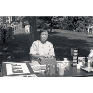 Cashier at an outdoor sale event