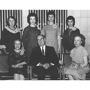 President Knowles poses with the women honored at Staff Luncheon