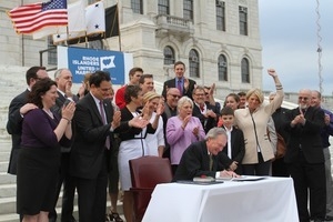 Rhode Island Governor Lincoln Chafee signs Same Sex Marriage Bill