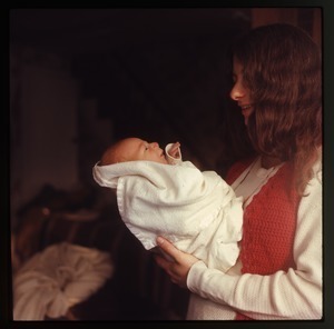 Nina Keller, holding her baby (Eben), Montague Farm Commune