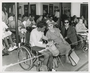 Women in wheelchairs eating lunch