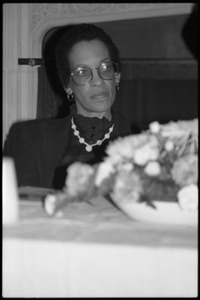 Johnnetta Cole, seated at the speakers' table at the 10th anniversary celebrations for Women's Studies at UMass Amherst