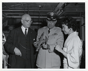 Mark Bortman with an unidentified U.S. Air Force member and an unidentified woman