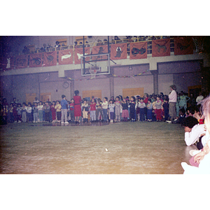 Children singing at a Chinese Progressive Association New Year's event