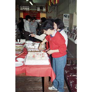 Cake-cutting at an International Women's Day event