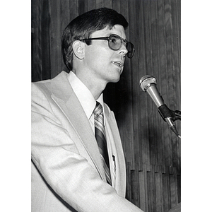 Victor Warner, Acting Dean of the College of Pharmacy, speaking into a microphone