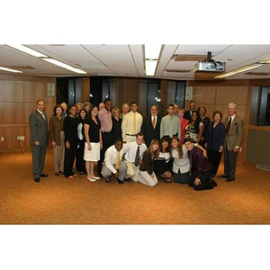 The Torch Scholars pose with the guests at their dinner