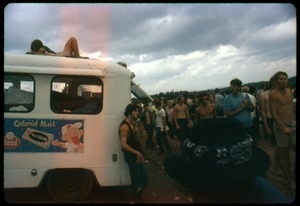 Crowd around a food concession truck at the Woodstock Festival