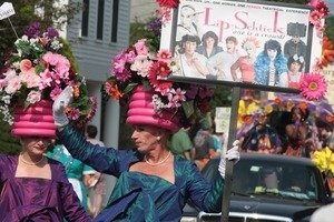 David Scarbie Mitchell (center) with flowerpot hat marching in the parade : Provincetown Carnival parade