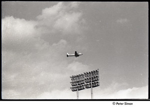Mets at Shea Stadium: airplane above stadium lights