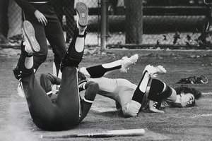 Collision at home plate in a softball game
