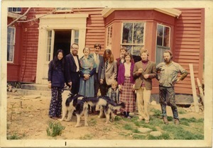 Group posed in front of the farmhouse, Montague Farm Commune