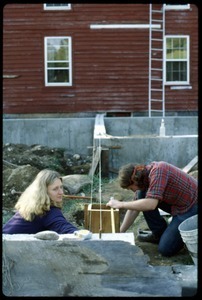 Janice Frey and Sam Lovejoy working on the greenhouse foundation, Montague Farm Commune