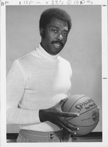Ray Wilson holding a basketball