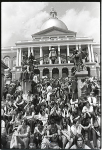 Demonstration at State House against the killings at Kent State: protesters seated on State House steps