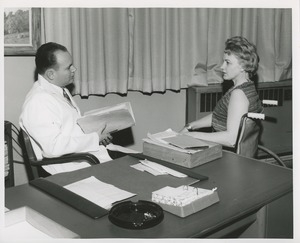 Mrs. Frances Marsala seated in her wheelchair at a doctor's office