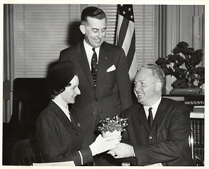 Mayor John F. Collins with unidentified man and woman