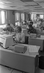 Unidentified call center workers in Boston Police Dispatch Operations Center