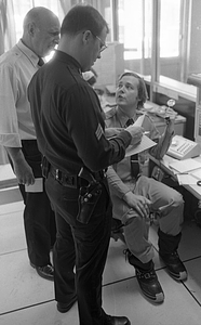 Unidentified officers in Boston Police Dispatch Operations Center