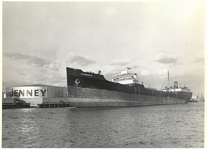 [View of the "Pan Massachusetts" ship in front of Jenney Manufacturing Company tank]
