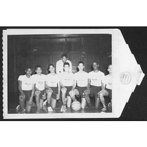 Framed group portrait of young men's basketball team