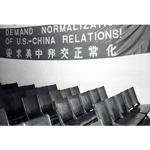 Banner reads, "Demand Normalization of U.S.-China Relations!"