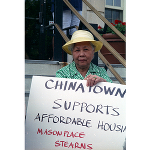 Demonstrator protests for affordable housing