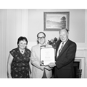 President Kenneth Ryder presenting certificate to Morton Rubin at Retirement dinner