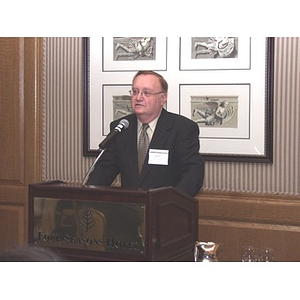 Barry Karger addressing audience at gala dinner