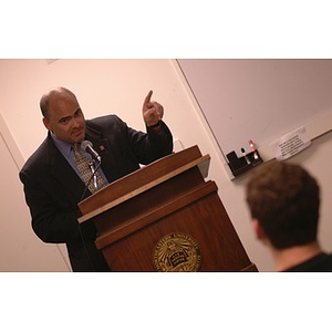 Ed Klotzbier pointing during a speech to the Student Senate