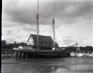 Two-masted sailing ship in dry dock
