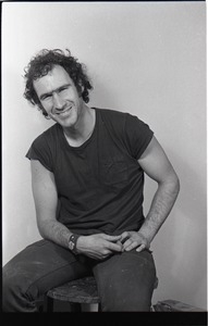 Studio portrait of Richard Safft, seated on a stool