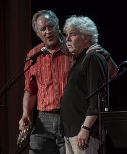 Tom Rush with Tom Chapin on stage at the For Pete's Sake concert, Clearwater Festival, Tarrytown Music Hall