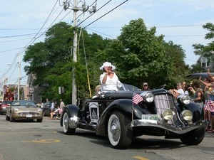 Carnival Queen riding in an old car: Provincetown Carnival parade