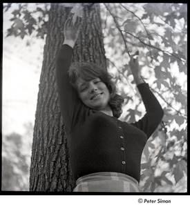 Lucy Simon with arms raised