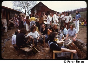 Gathering with musical instruments at May Day celebration, Packer Corners commune