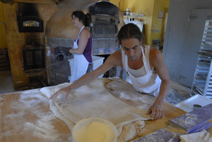 Hungry Ghost Bread: owner and baker Jonathan C. Stevens working on cinnamon rolls