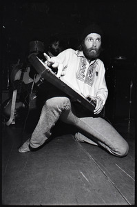 Beach Boys at Boston College: Mike Love kneeling with keyboard, Carl Wilson in background