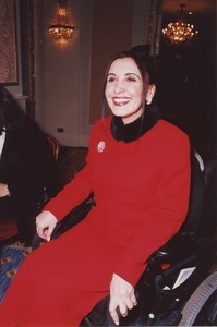 Woman in wheelchair smiling