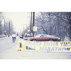 View of steet and sign for the Boston Athletic Association (BAA) marathon