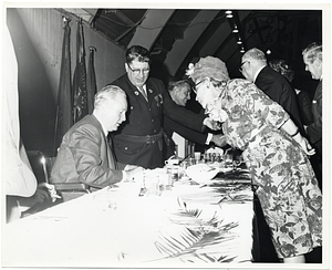 Mayor John F. Collins with an unidentified man and woman