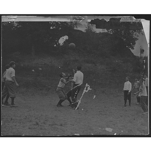 Young men playing a ball game
