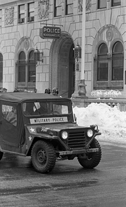 Military Police vehicle in front of Boston Police Headquarters on Berkeley Street