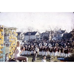 Homecoming parade float and marching band